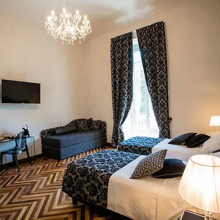 Couette-café Maison Rêve Centro 4*